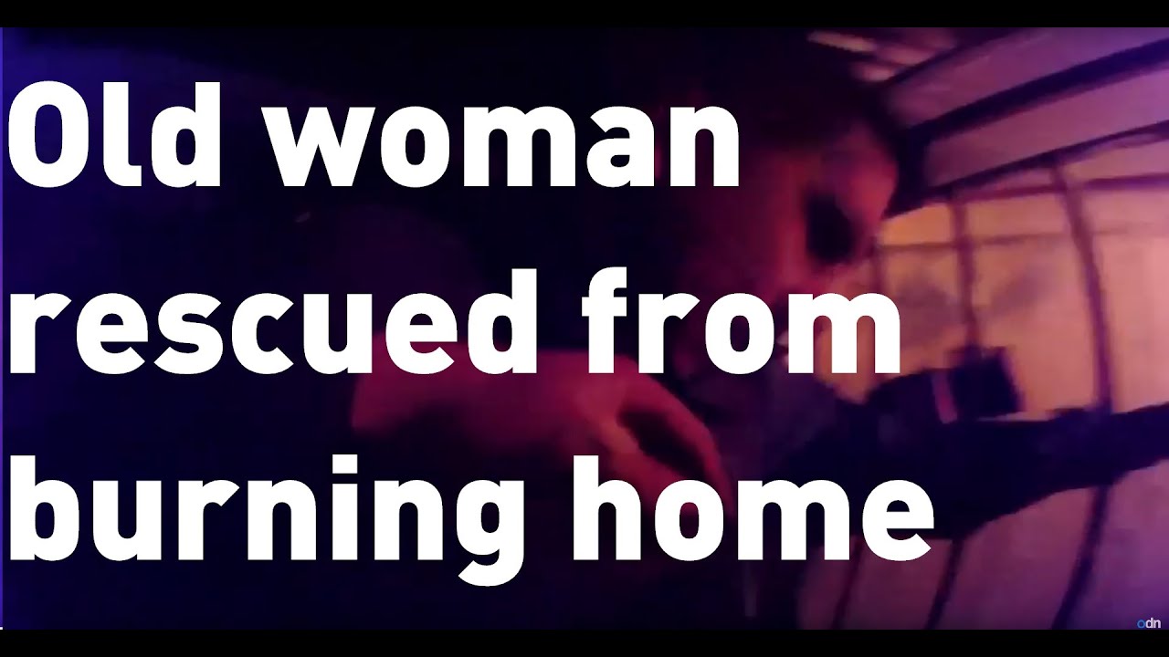 Shocking footage of elderly woman rescued from burning home - YouTube