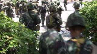 Troops crack down on Bangkok protests