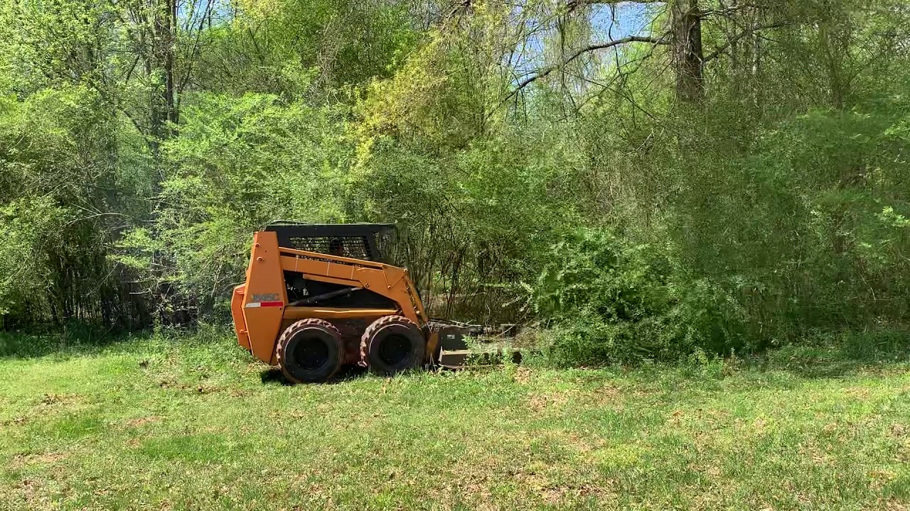Brush clearing in Gainesville case 1845c skid steer with