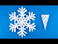 How to cut a traditional snowflake out of paper 