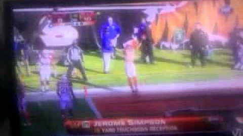 Jerome Simpson backflips over defender for a touchdown