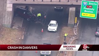 SUV flies off overpass, crashes into guardrail