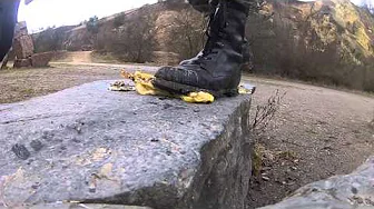 Two army boots crushes food