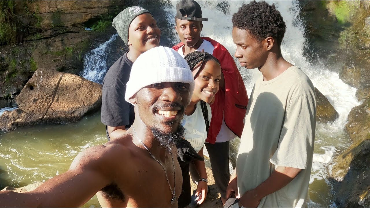 I FOUND BEAUTIFUL ENDOWED AFRICAN WOMEN IN A RIVER WATERFALL CHILLING, I HAD TO APPROACH.