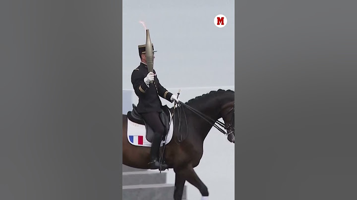La antorcha olímpica llega a París en el día de la Fiesta Nacional en Francia I MARCA #shorts