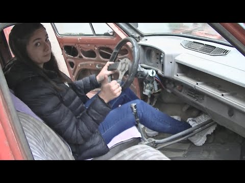 GIRL RESCUE OLD CAR AND REVVING ENGINE