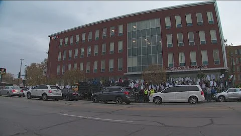 Minneapolis teachers rally after voting for a strike