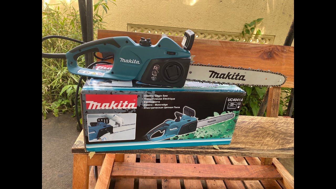 Пила цепная uc4041a. Makita uc4041a. Цепная электрическая пила Makita uc4041a. Makita uc4041a кейс. Бензопила Макита 4041.