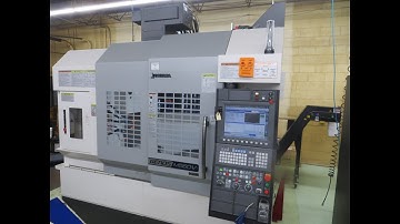 Okuma Genos M560-V 4-Axis CNC Vertical Machining Center, Tsudakoma Rotary Table, TS Coolant, Probing