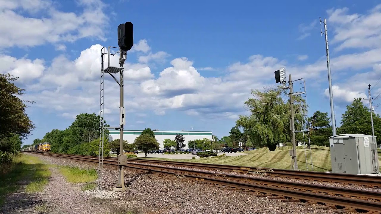 UP 2490 (SD60M) leads a UP sand train past Glenview