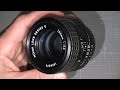 Stiff focus ring In Nikon Lens Series E  100mm 1:2.8