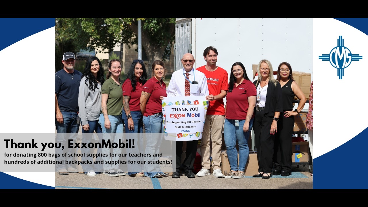 Video preview image of Members of ExxonMobil stand with superintendent Dr. Gerry Washburn with a sign that reads "Thank you, ExxonMobil!"; click to visit the ParentSquare post with the video