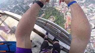James Marples Base jump off a rope swing at KL tower