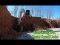 Digging Out Part Of A Basement And Spreading Rock