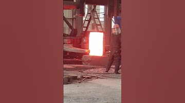 Ultra dangerous heavy-duty forging, high-temperature forging of a 1000 degree rectangular iron block