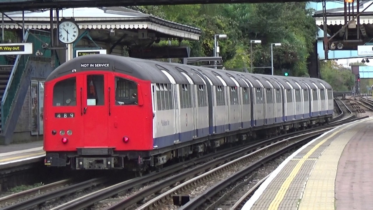 London Underground 1962 Stock 1447 and 1570 passing North Acton
