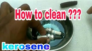 Clean Spark plug in kerosene
