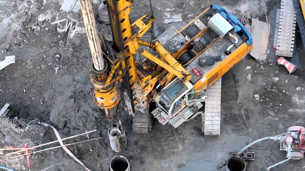 Bauer BG28 drill rig working - YouTube
