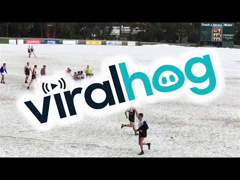 footballers-continue-game-following-huge-hail-storm-||-viralhog