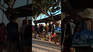 People in Line Waiting for Free / Cheap Pizza in Waikiki Wealth