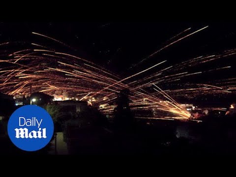 Greek churches celebrate Easter by firing rockets at each other - Daily Mail