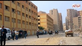 أخبار اليوم | تلال القمامة تحاصر مجمع مدارس الصفا والمروة بالجيزة
