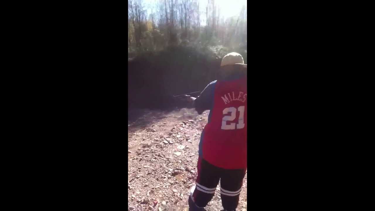 A-Town shooting a shotgun