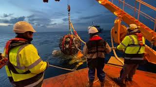 Over-boarding a detection unit for the ORCA detector of KM3NET.