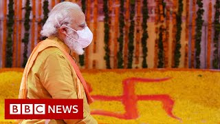 India PM Modi leads temple rituals at divisive holy site