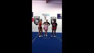 Kendall doing 2 stunts: full ups into prep, power press to extension lib, heel stretch to full down
