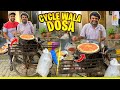 Hardworking man selling 100 varieties of dosa on cycie  cycle    kitchen   