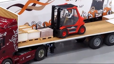 NEW RC Forklift truck drive in warehouse & Unloading a Trailer!