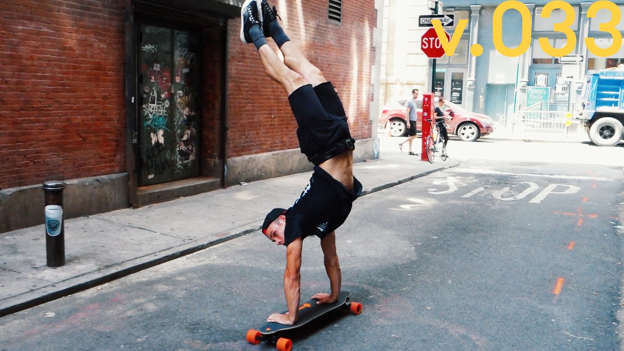 HANDSTAND WHILE RIDING BOOSTED BOARD - YouTube