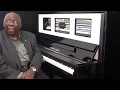 Oliver jones met  lessai le piano droit magic de marque esmonde white