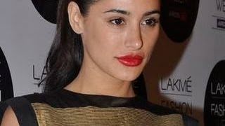 Nargis Fakhri goes BOLD for FHM cover