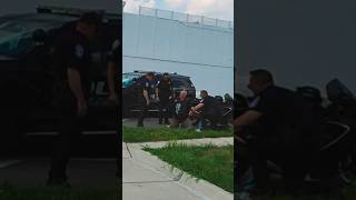 WOODWARD DREAM CRUISE - Biker takes a fall, F.P.D. helps, Corvette, Accounting Aid Society.