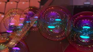 The soap bubbles which reflect back arena lights part2