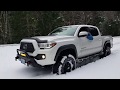 Tacoma 2018 Snow playing out in the woods  2 23 2019