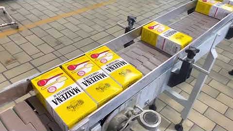 Shrink wrapping machine for stacked boxes