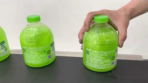 TIJ Online printer printing on plastic bottles.