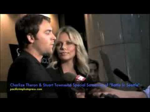 BATTLE IN SEATTLE - Charlize Theron & Stuart Towns...