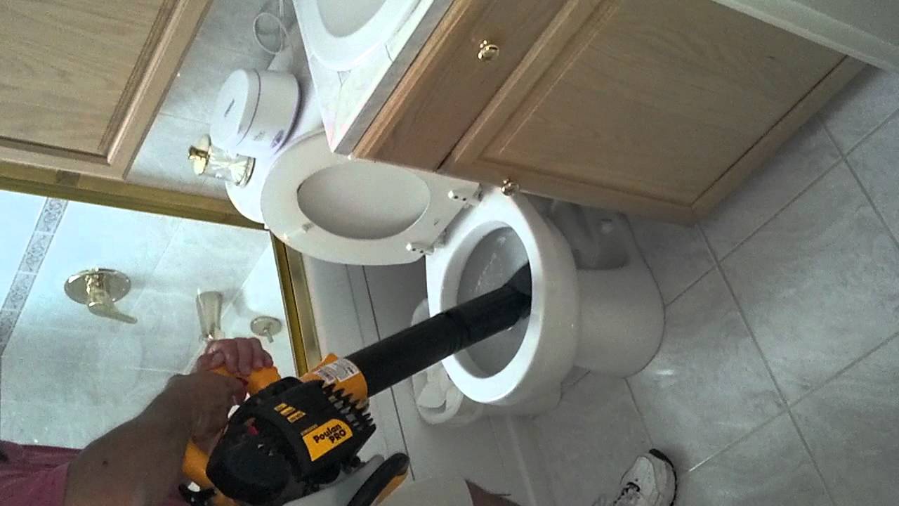 Unclogging a toilet with a leaf blower YouTube