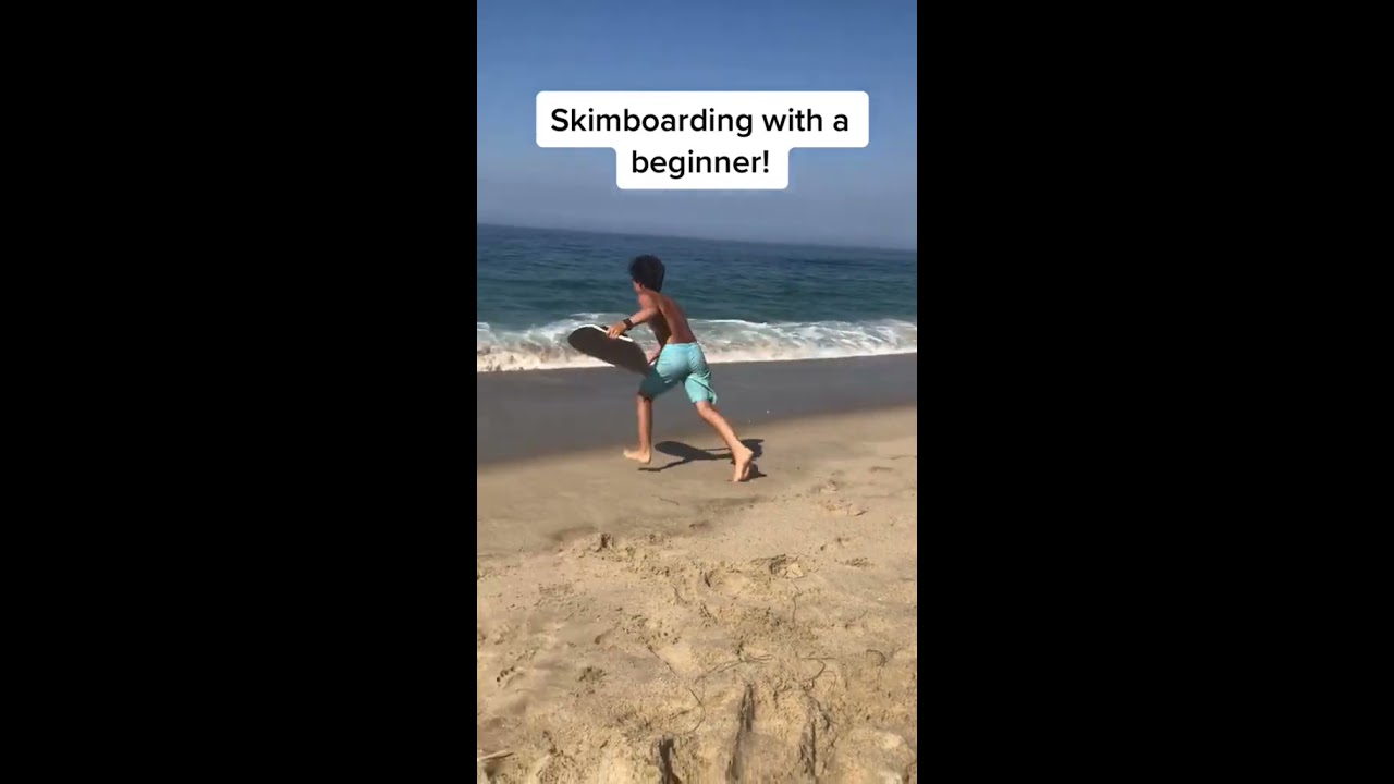 TEACHING A BEGINNER HOW TO SKIMBOARD