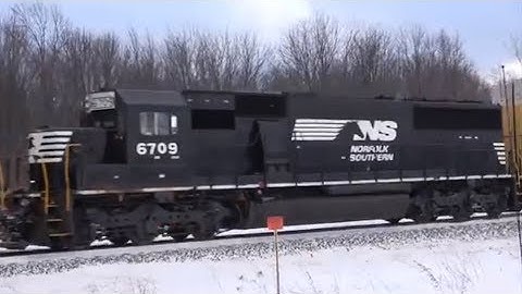 EMD SD60  NS 6709 Trailing on Auto Rack Train
