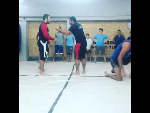 Double leg in to Russian swipe and in to low katag