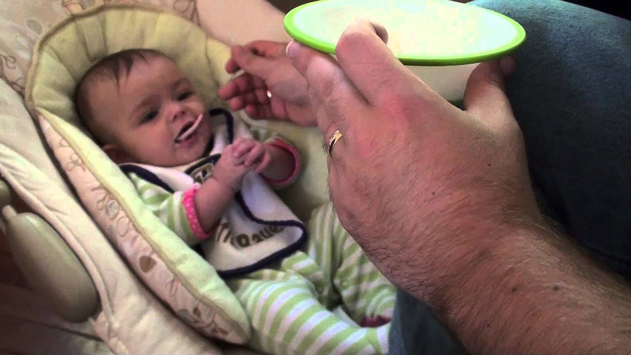 Alyssa eating rice cereal