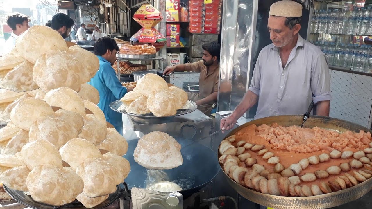 Soft and Puffy Poori Makings Halwa Street Food Pakistan Street Food Funda thefoodranger