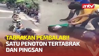 BERAWAL DARI SENGGOLAN ANTAR PEMBALAP MENYEBABKAN SATU PENONTON PINGSAN