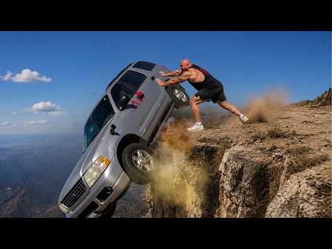 World's Strongest Man Flips a Car Off a Cliff
