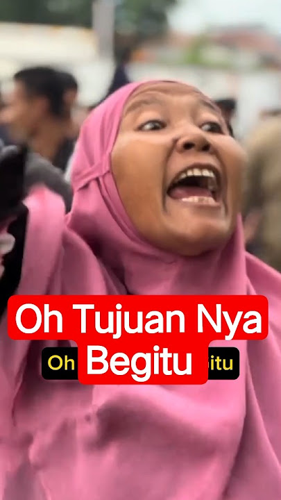 Mother wearing pink headscarf demonstrating #demo #dpr #ojol #brimob #anies #prabowo #president